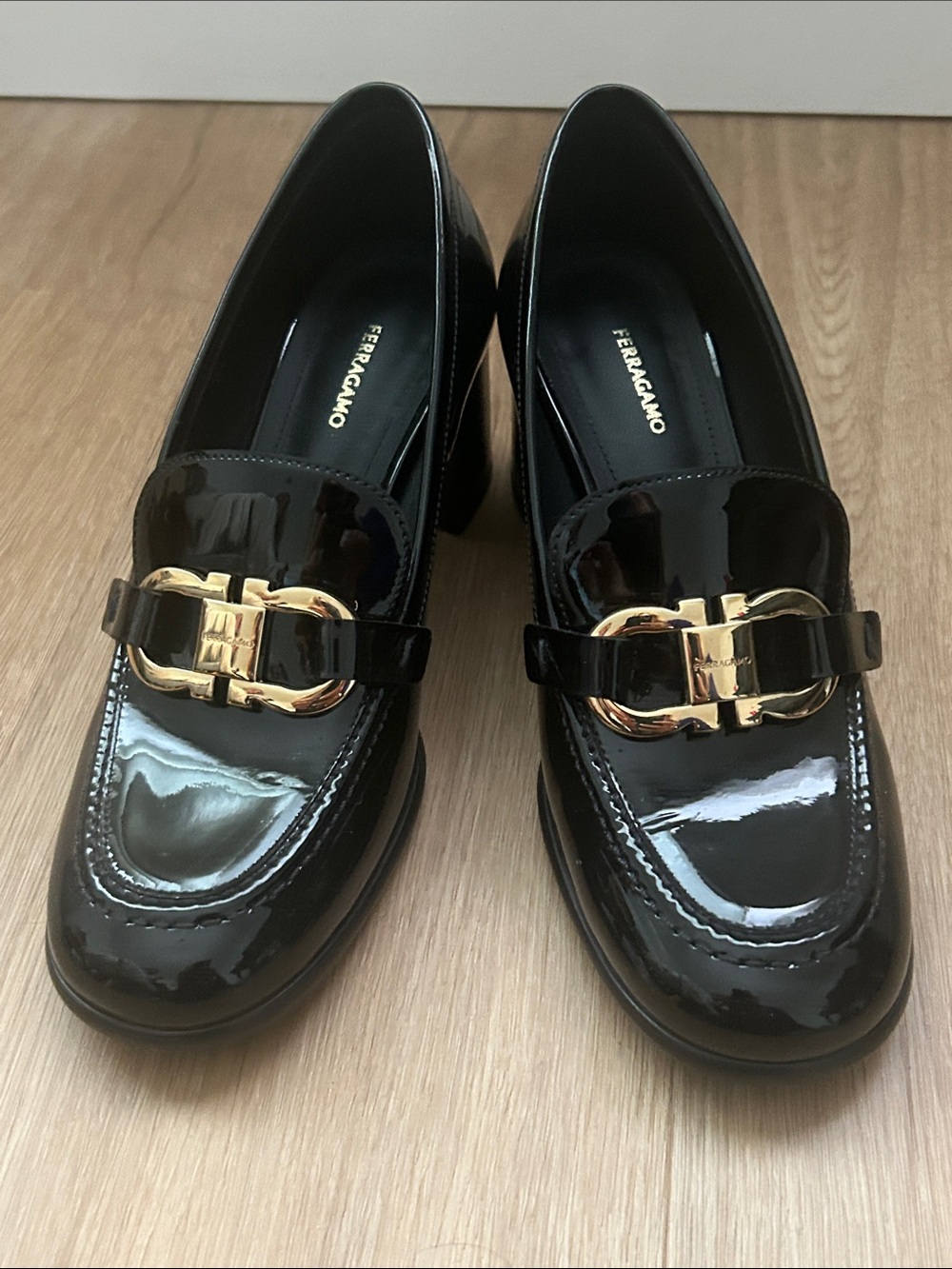 Salvatore Ferragamo Black Patent Loafers with Gold Hardware